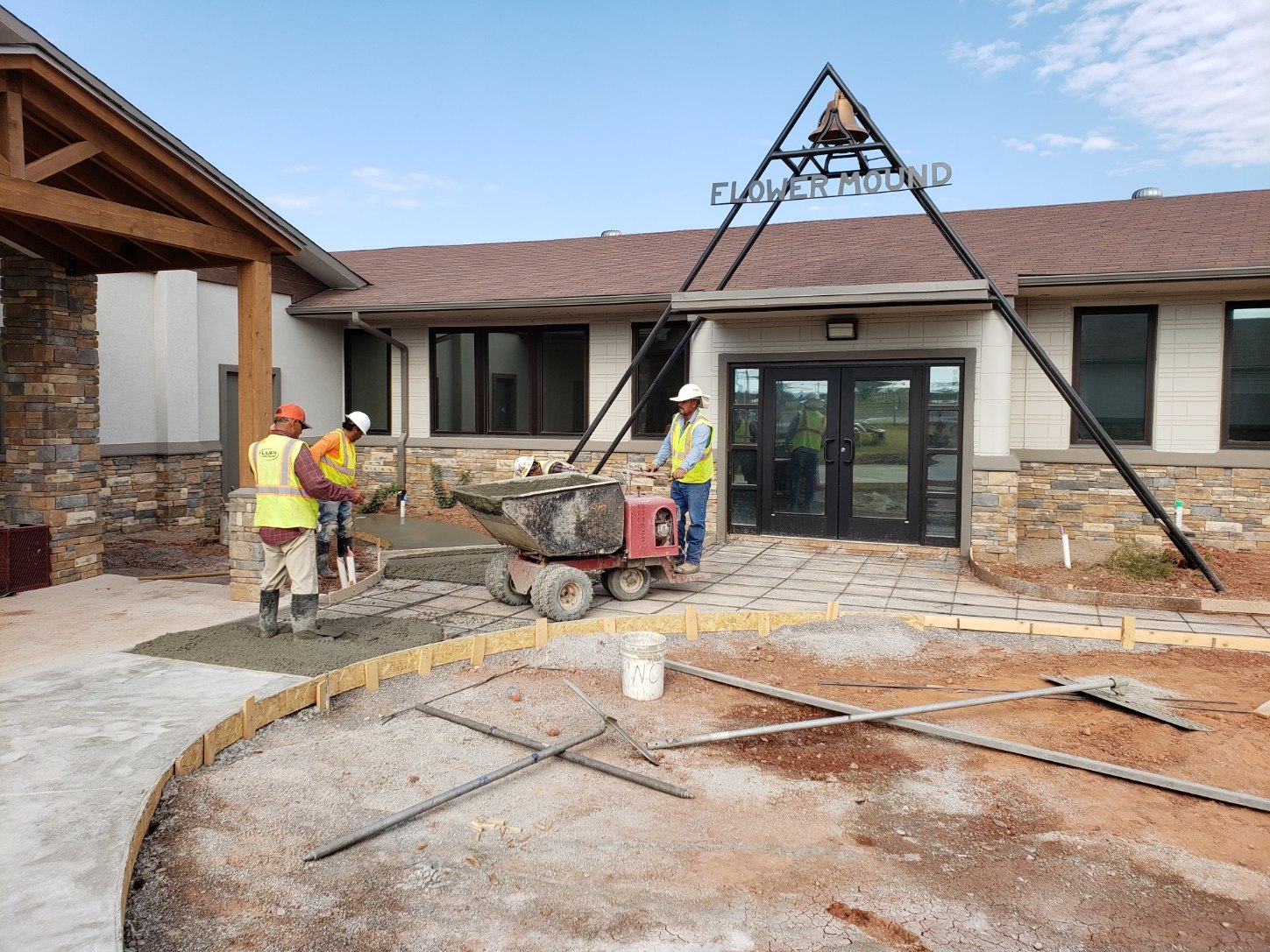 Stone entrance under construction at an education facility built by Clear Creek Developments